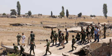 تشييع جماعي لضحايا الهجوم على حافلة للجيش السوري